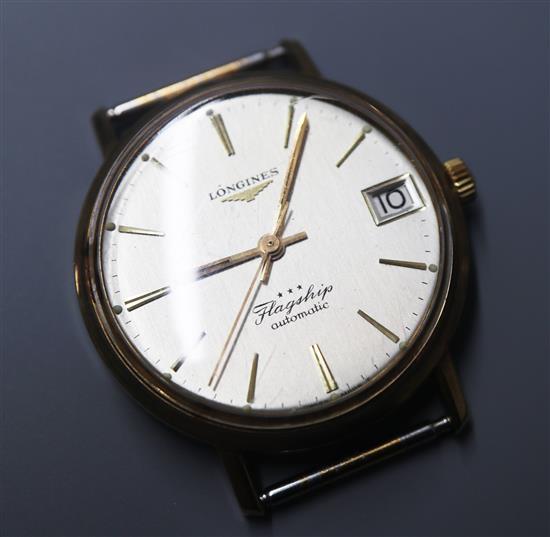 A gentlemans 9ct gold Longines Flagship automatic wrist watch, with case back inscription (no strap).